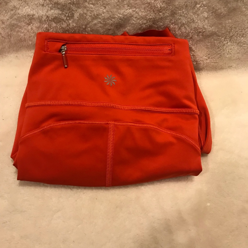 Athleta orange cropped leggings